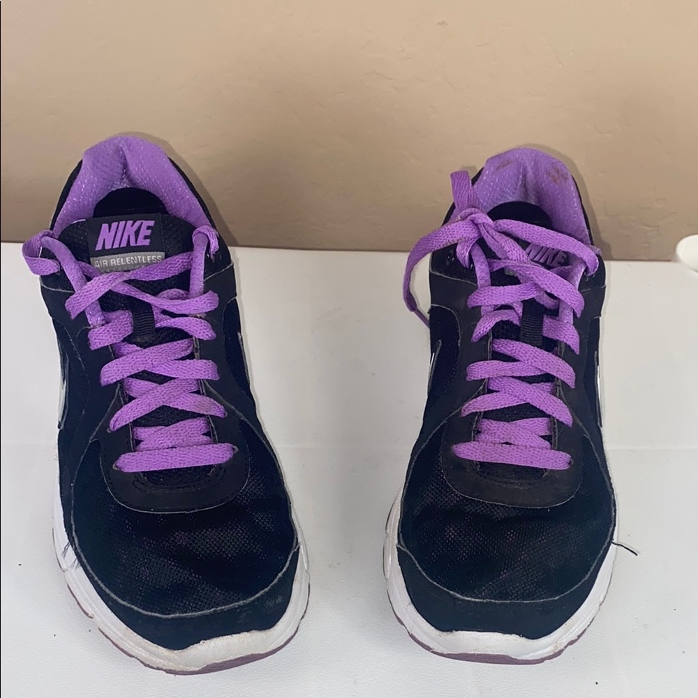Nike Black and Purple Sneakers with Classic Silhouette
